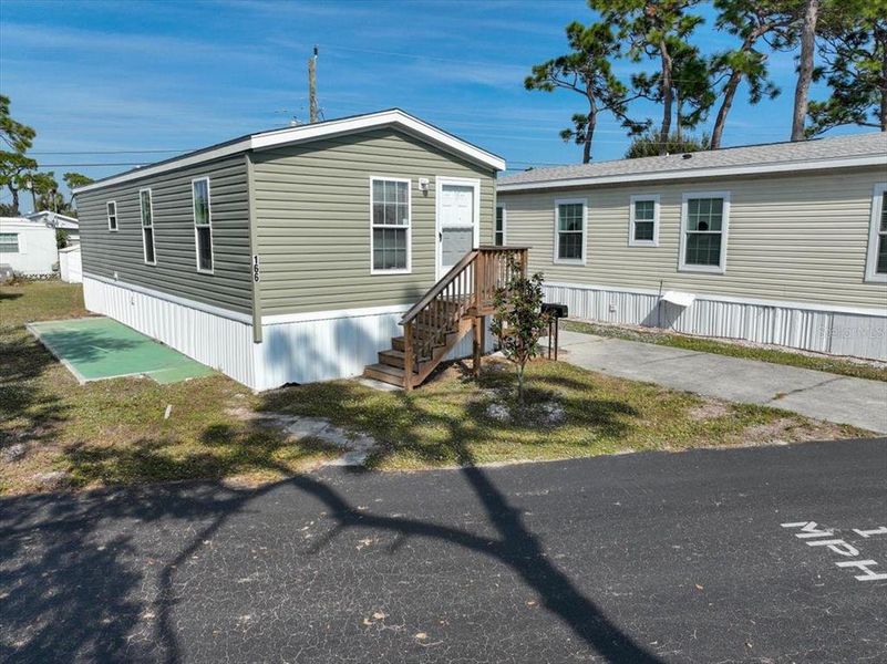 Exterior details and patio area of a home in , Englewood (Image 16).