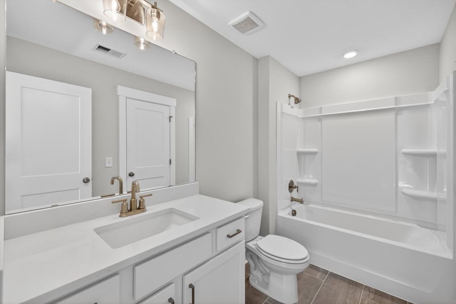 Furnished interior view inside a new home in Academy Park, Beaufort (Image 21).