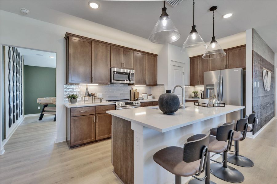 Model home photos of similar floorplans, not pictures of actual home.