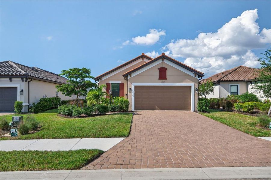 Front exterior of a new home in , Bradenton, FL, highlighting curb appeal (Image 2). Front exterior of a new home in , Bradenton, FL, highlighting curb appeal (Image 2).