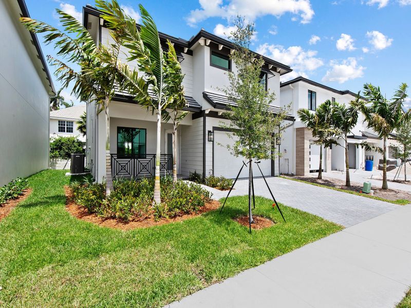 Representative exterior photo of a completed home built from the The Ketch by 13th Floor Homes in Marina Landings, Fort Lauderdale, FL (Image 1). Representative exterior photo of a completed home built from the The Ketch by 13th Floor Homes in Marina Landings, Fort Lauderdale, FL (Image 1).