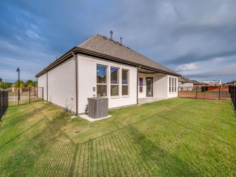 Exterior details and patio area of a home in Ladera Little Elm, Little Elm (Image 3).