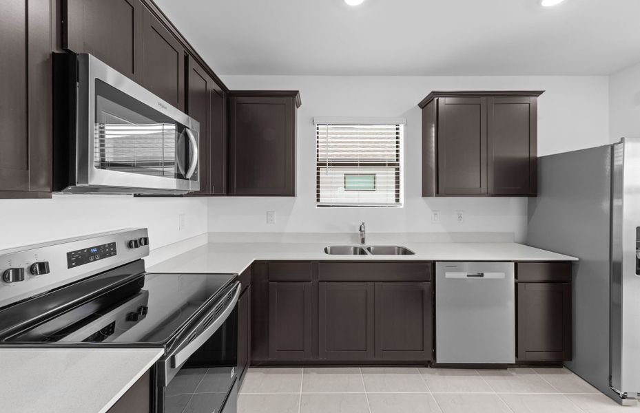 Furnished interior view inside a new home in Caloosa Cove, Labelle (Image 11).