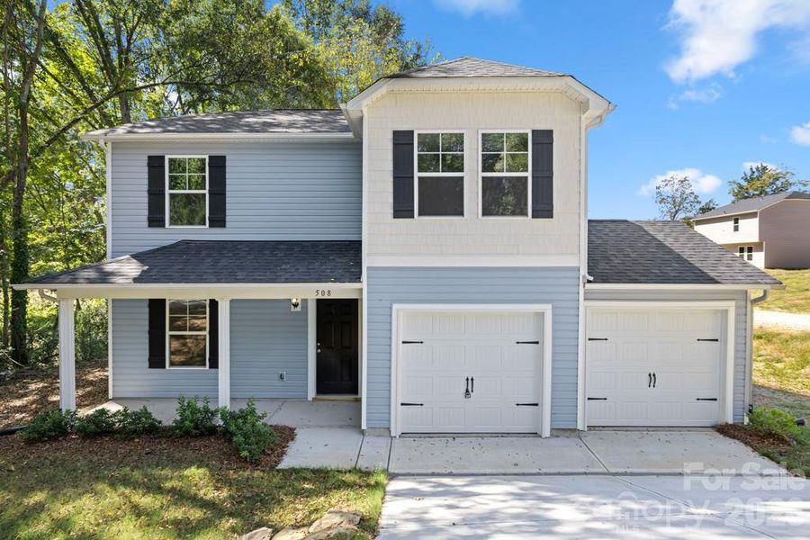 Front exterior of a new home in , Lancaster, SC, highlighting curb appeal (Image 19).