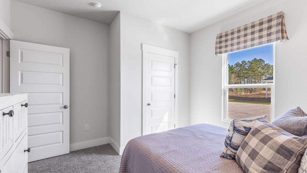 Furnished interior view inside a new home in Colonial East, Panama City Beach (Image 27).