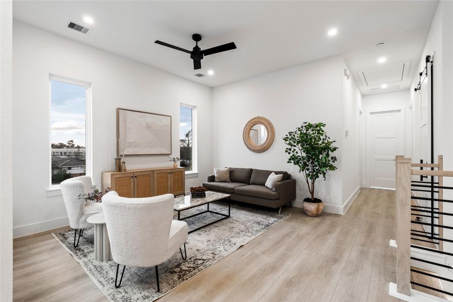 With generous proportions and elevated views, the upstairs living space adapts effortlessly to your lifestyle—whether hosting guests or carving out a peaceful hideaway.