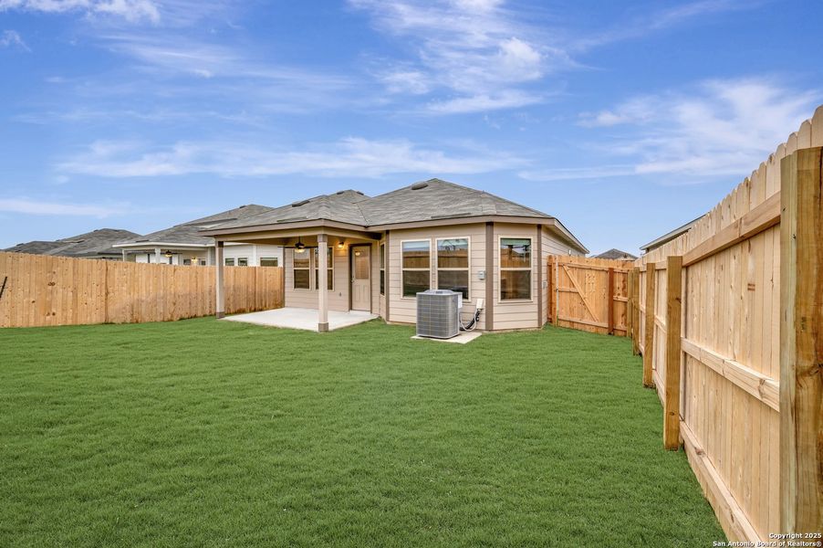 Exterior details and patio area of a home in Park Place, New Braunfels (Image 20).
