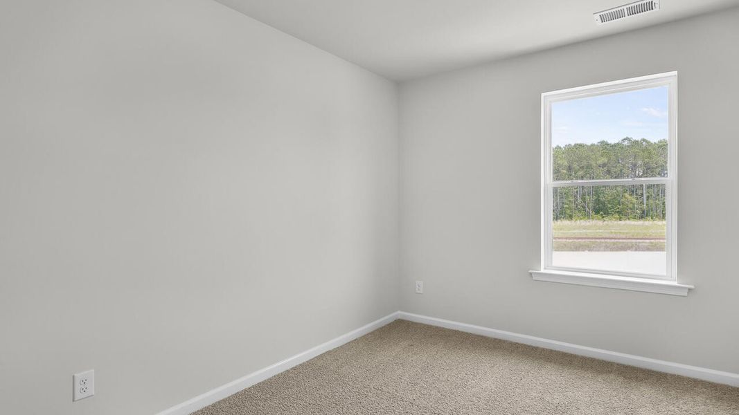 Spacious, unfurnished interior of a new home in Townes at Seabrooke, Leland (Image 25).