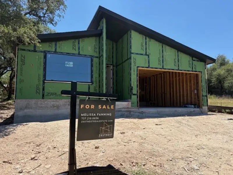 A contemporary new construction, framed and ready for custom finishes, awaits its new owner. A contemporary new construction, framed and ready for custom finishes, awaits its new owner.