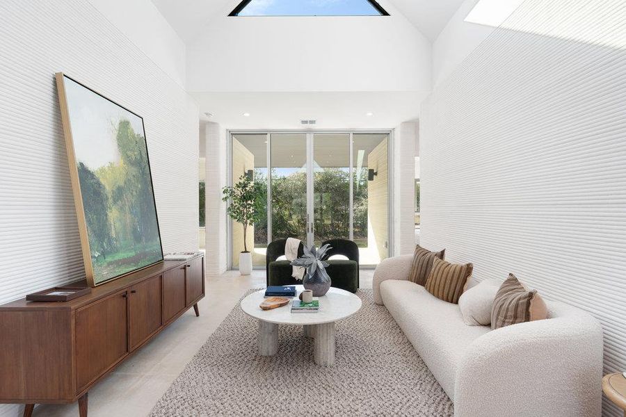 Living room with lofted ceiling