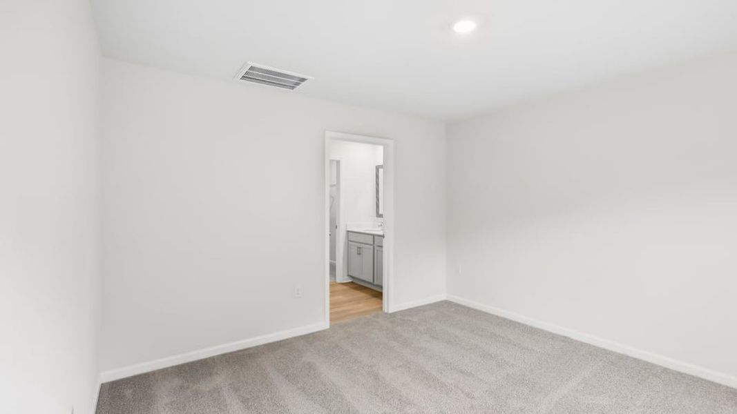 Spacious, unfurnished interior of a new home in Ravencrest, Roebuck (Image 29).