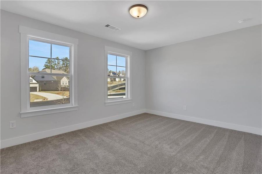 Spacious, unfurnished interior of a new home in Cambridge, Flowery Branch (Image 18).