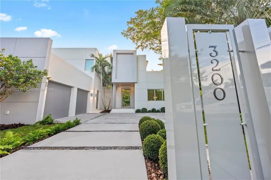 Front exterior of a new home in , Miami, FL, highlighting curb appeal (Image 1). Front exterior of a new home in , Miami, FL, highlighting curb appeal (Image 1).