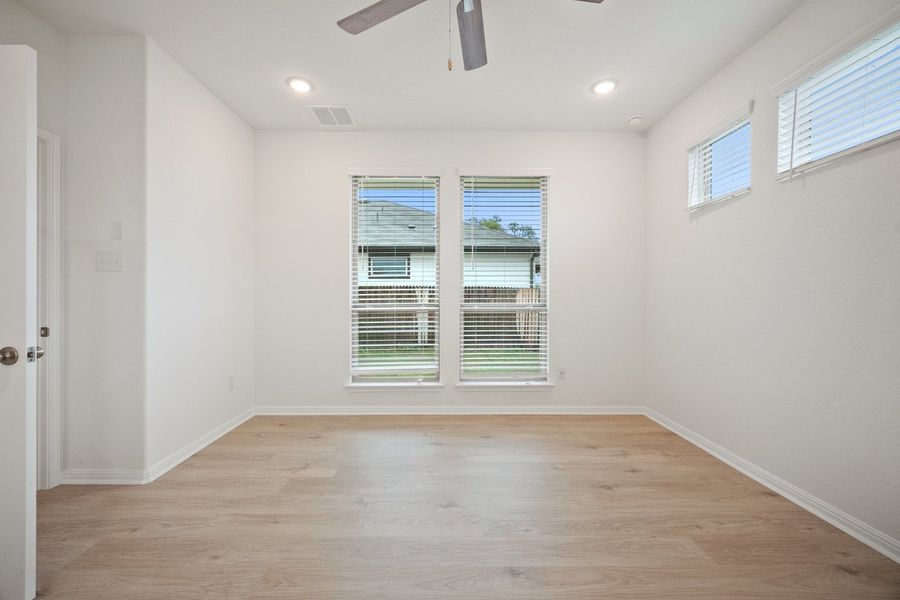 Spacious, unfurnished interior of a new home in The Hills of Bear Creek, Manchaca (Image 15).