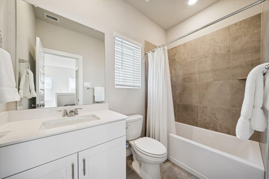 Furnished interior view inside a new home in Spring Brook Village - City Series, Houston (Image 18).