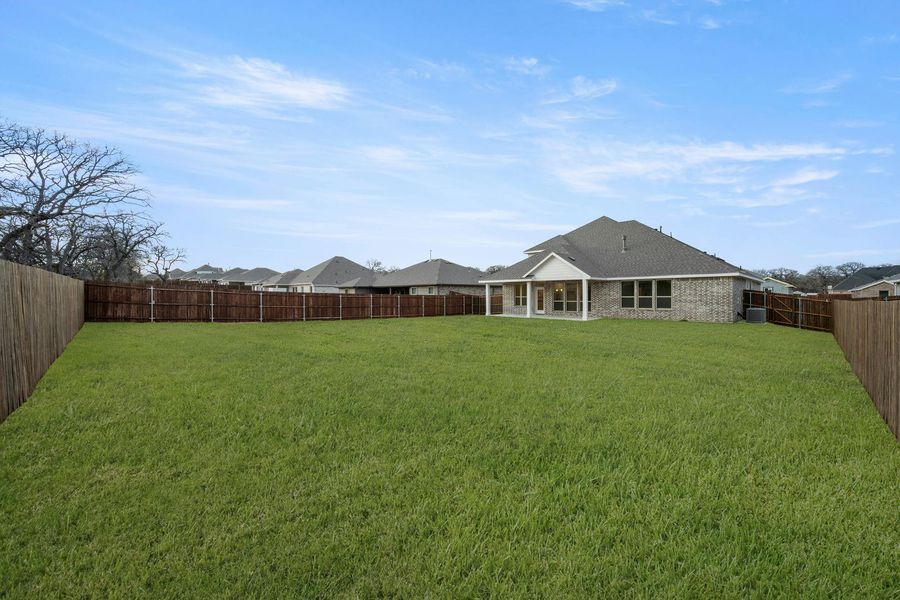 Exterior details and patio area of a home in Stone Eagle, Azle (Image 4).