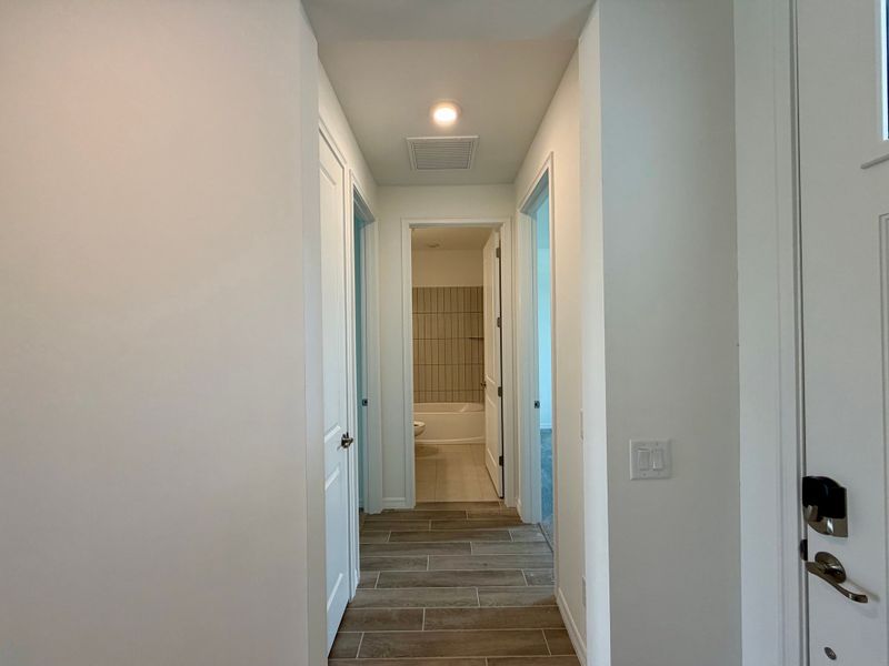 Representative unfurnished interior of a home built from the Juno by William Ryan Homes in The Sanctuary – Resort Collection, Punta Gorda (Image 27).