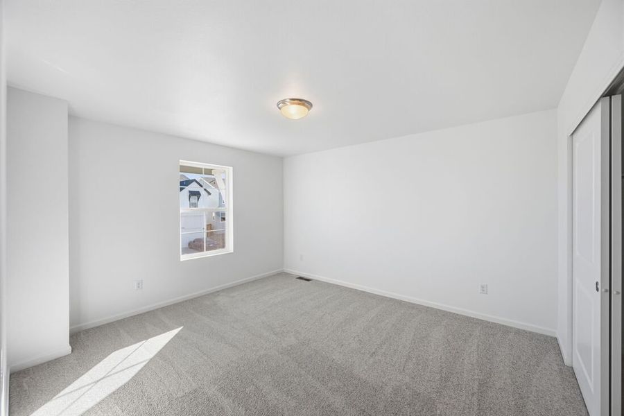 Spacious, unfurnished interior of a new home in Trailstone, Arvada (Image 27).