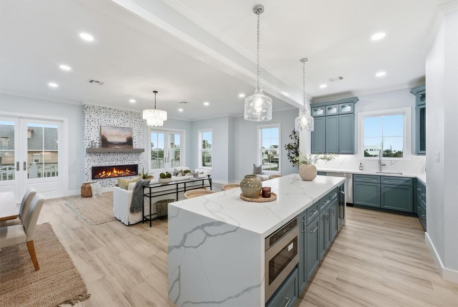 Extra large center island with intergrated microwave drawer and wine fridge.