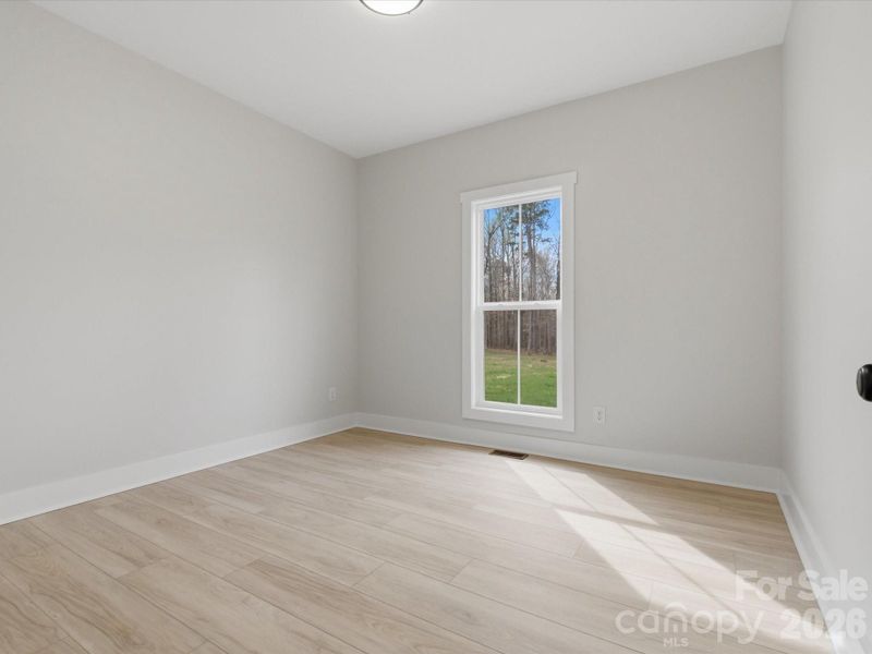 Spacious, unfurnished interior of a new home in , Bessemer City (Image 24).