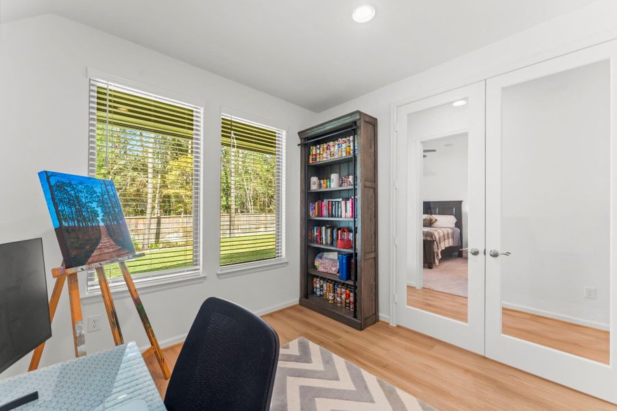Beautiful glass French doors provide added privacy.