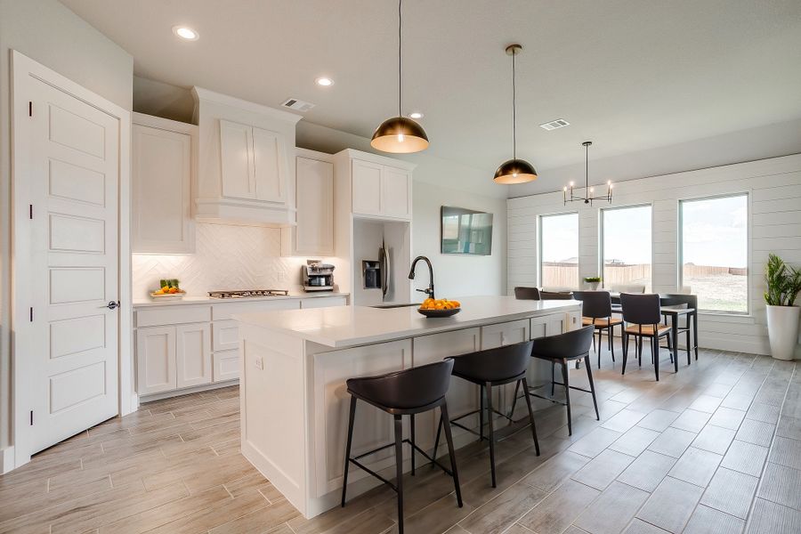 Representative furnished interior of a home built from the The Abilene by Kenmark Homes in Coyote Crossing, Godley (Image 8). Representative furnished interior of a home built from the The Abilene by Kenmark Homes in Coyote Crossing, Godley (Image 8).