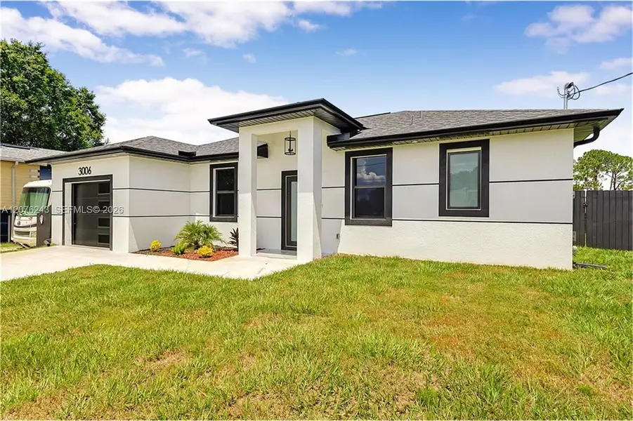 Exterior details and patio area of a home in , Lehigh Acres (Image 3).