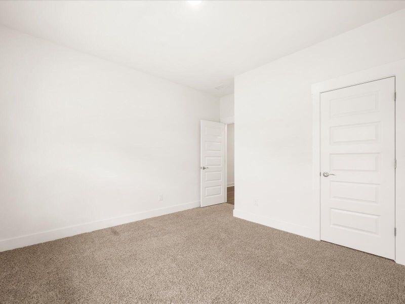 Spacious, unfurnished interior of a new home in The Coves at Lakes of Cane Bay, Summerville (Image 32). Spacious, unfurnished interior of a new home in The Coves at Lakes of Cane Bay, Summerville (Image 32).