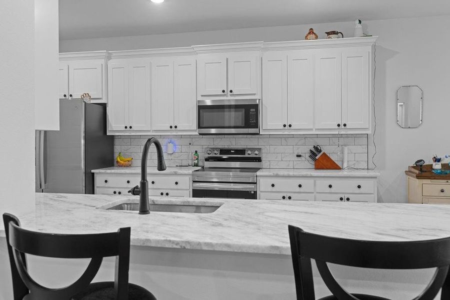 Furnished interior view inside a new home in , Whitesboro (Image 23).