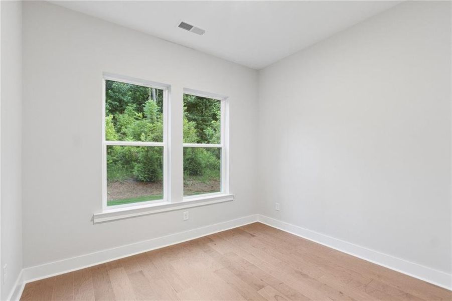 Spacious, unfurnished interior of a new home in Settingdown Farms, Cumming (Image 17).