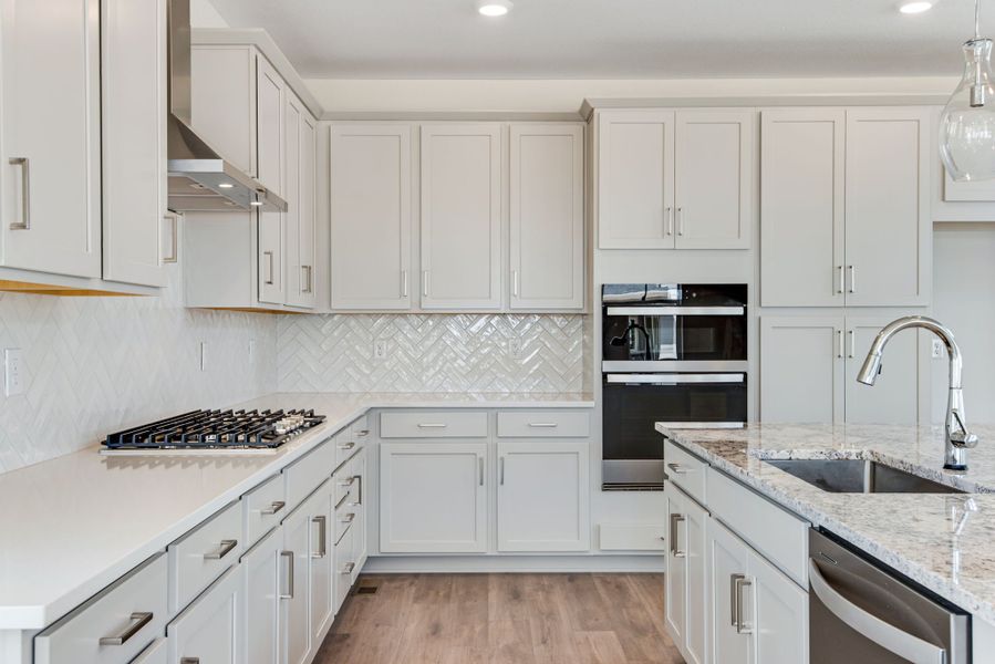 Furnished interior view inside a new home in The Aurora Highlands, Aurora (Image 7).