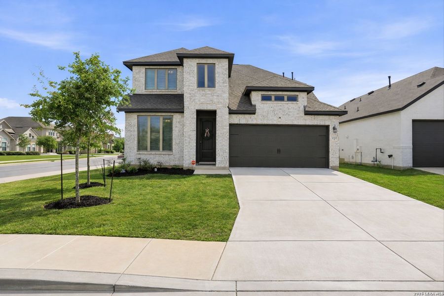 Front exterior of a new home in Davis Ranch, San Antonio, TX, highlighting curb appeal (Image 26).