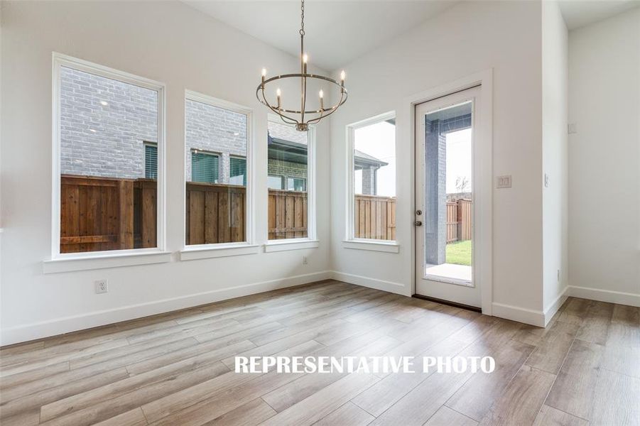Located just off the kitchen and filled with natural light, the breakfast nook is the perfect place for the family to gather.  REPRESENTATIVE PHOTO