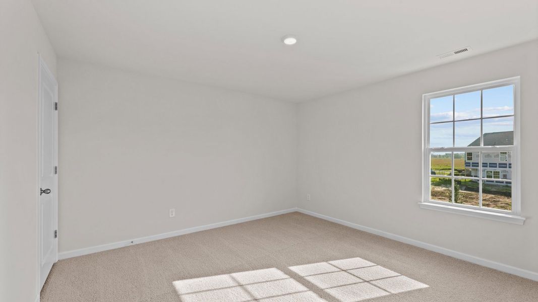 Spacious, unfurnished interior of a new home in Ridgewood Farms, Winterville (Image 16).