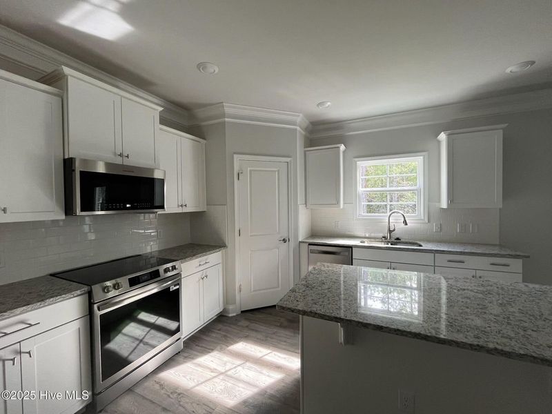 Furnished interior view inside a new home in Palmetto Creek, Bolivia (Image 8).