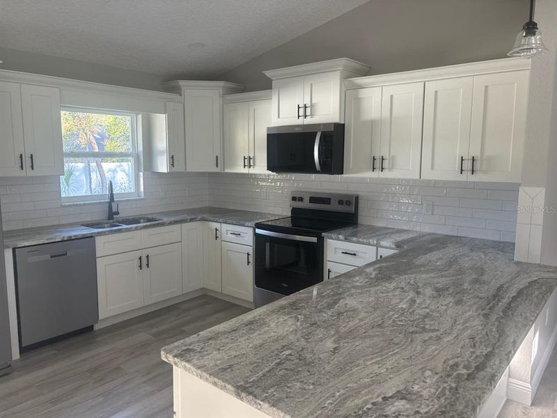 Furnished interior view inside a new home in , Dunnellon (Image 6).