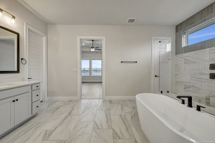 Furnished interior view inside a new home in Megans Landing – Half-Acre Homesites, Castroville (Image 10).