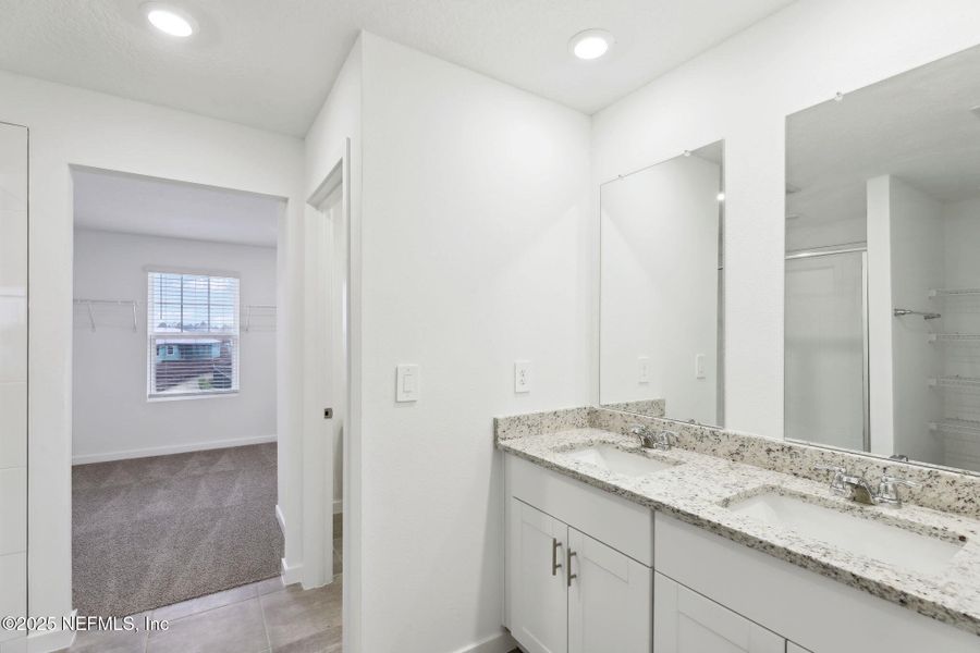 Furnished interior view inside a new home in Lakes at Bella Lago - Signature Series, Green Cove Springs (Image 6). Furnished interior view inside a new home in Lakes at Bella Lago - Signature Series, Green Cove Springs (Image 6).