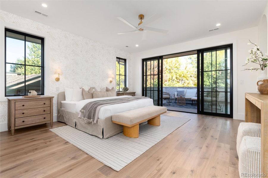 Primary with double doors leading to private trex deck! Like a tree house Primary with double doors leading to private trex deck! Like a tree house