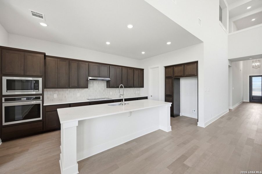 Furnished interior view inside a new home in Alsatian Oaks, Castroville (Image 11).
