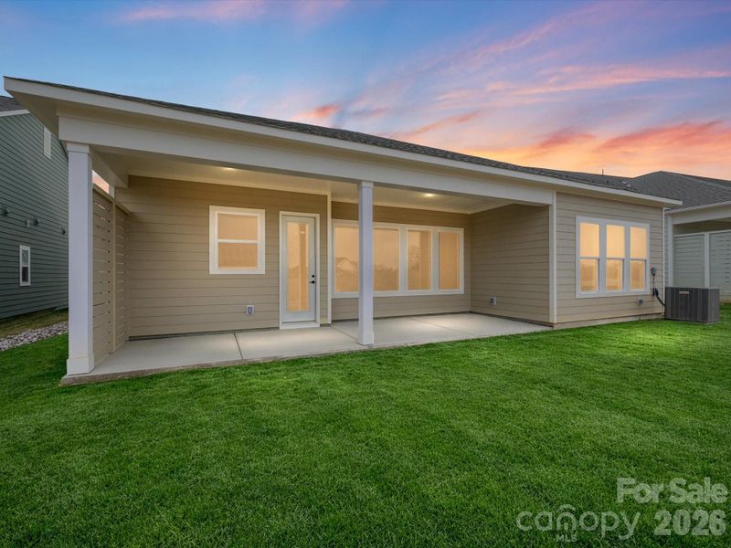 Exterior details and patio area of a home in Encore at Streamside - Tradition Series, Waxhaw (Image 4).