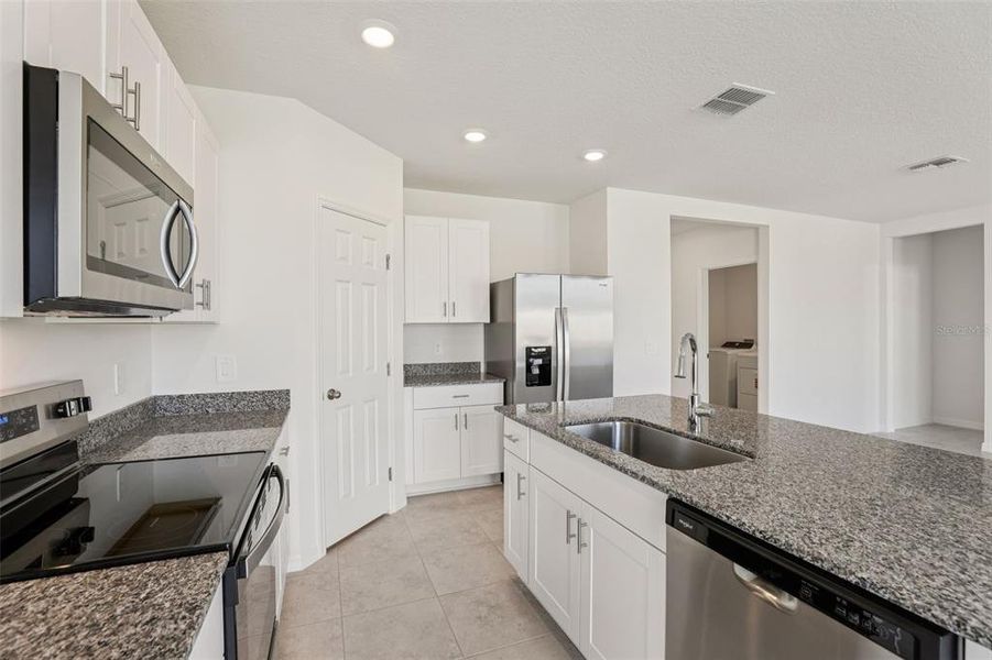 Furnished interior view inside a new home in Lawson Dunes - Signature Series, Haines City (Image 10).