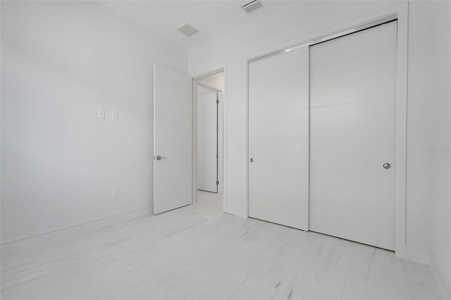 Spacious, unfurnished interior of a new home in Hampton Green at Providence, Davenport (Image 40).