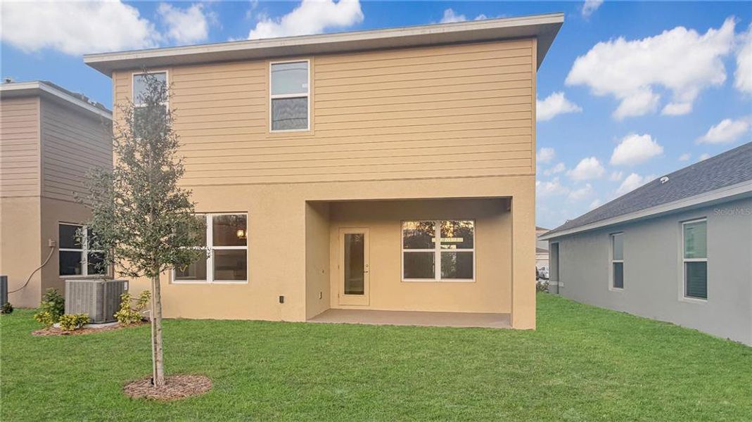 Exterior details and patio area of a home in Harmony Central, Harmony (Image 4).