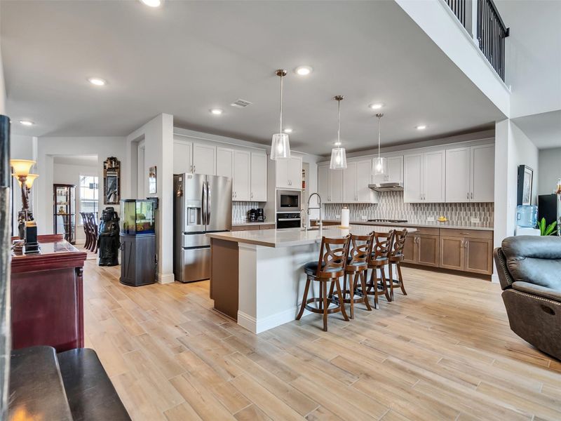 Kitchen island can accommodate 5 or 6 seats.  Perfect for entering
