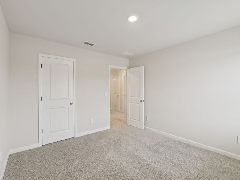 Spacious, unfurnished interior of a new home in Marshburn Landing - Bungalow Series, Wendell (Image 21).