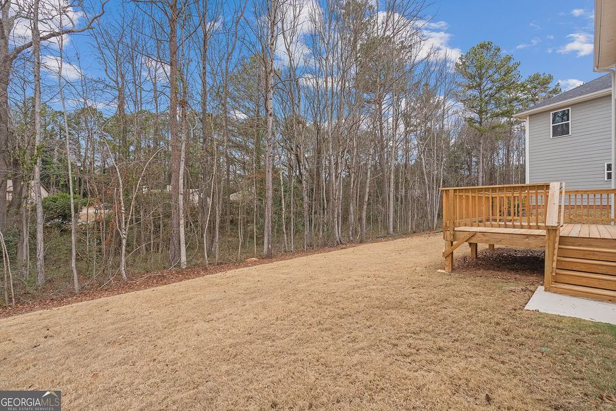 Exterior details and patio area of a home in Canterbury Villas, Carrollton (Image 22).