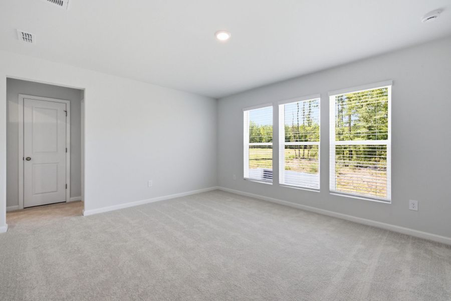 Spacious, unfurnished interior of a new home in Carpenter Falls, Durham (Image 29).