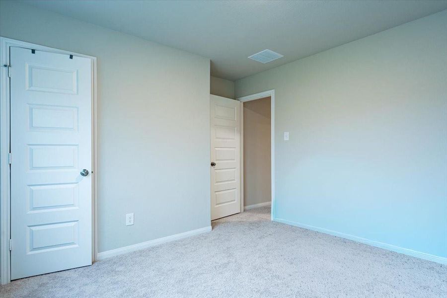 Spacious, unfurnished interior of a new home in River's Edge, Conroe (Image 22). Spacious, unfurnished interior of a new home in River's Edge, Conroe (Image 22).