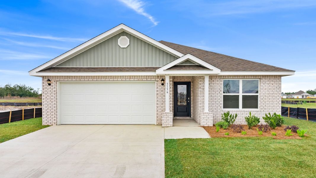 Front exterior of a new home in Hodges Bayou Plantation, Panama City, FL, highlighting curb appeal (Image 19). Front exterior of a new home in Hodges Bayou Plantation, Panama City, FL, highlighting curb appeal (Image 19).